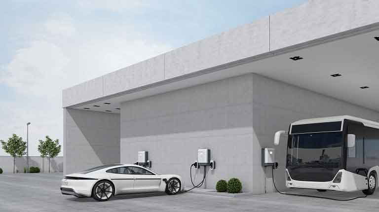 Photo of car and bus at electric charging stations